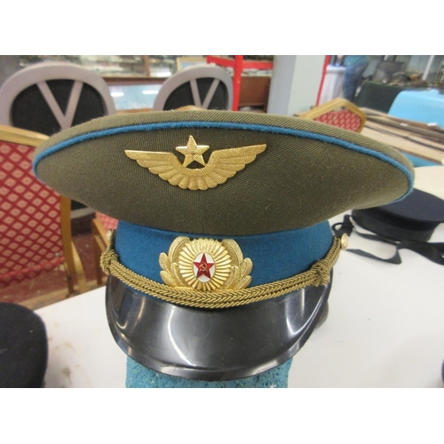 395 - Soviet AirForce Officer's visor cap plus 2 DDR East German military officer's caps and East German n... 