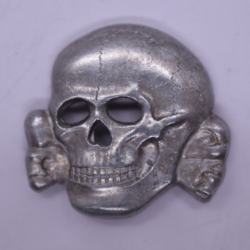 10 - German SS cap badge & SS skull (maker dated 1942)