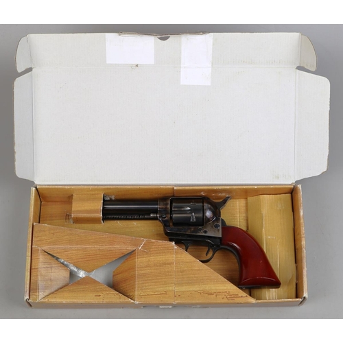 119 - Uberti. Colt 45 .380 Blanc 9mm blank firing replica No 85311, blued frame with walnut grip, in box