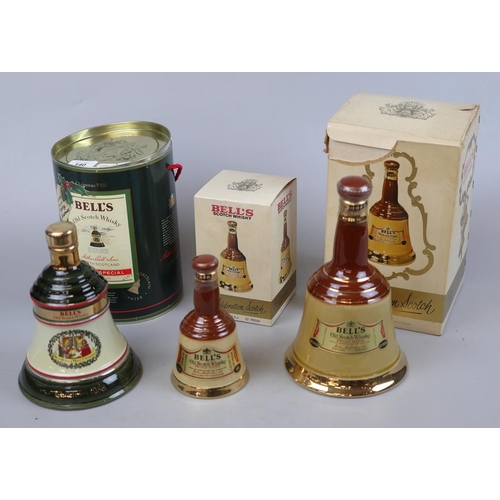 140 - 3 Bells whisky decanters with contents