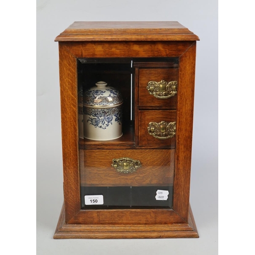 150 - Edwardian oak bevel glazed smokers cabinet with gilded, blue and white porcelain humidor and white m... 