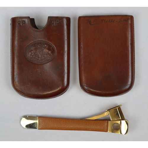 174 - Leather cigar case with crest, plus brass cigar cutter by Pfeilring of Solingen.