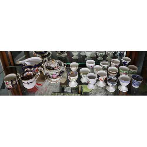 193 - Collection of ceramics to include egg cups to include antique examples