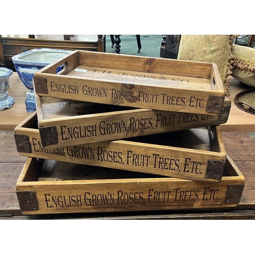 226 - Set of 4 graduated wooden advertising trays