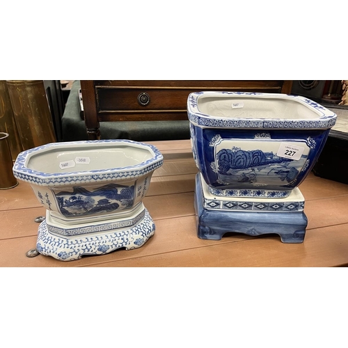 227 - 2 Oriental blue and white planters with stands