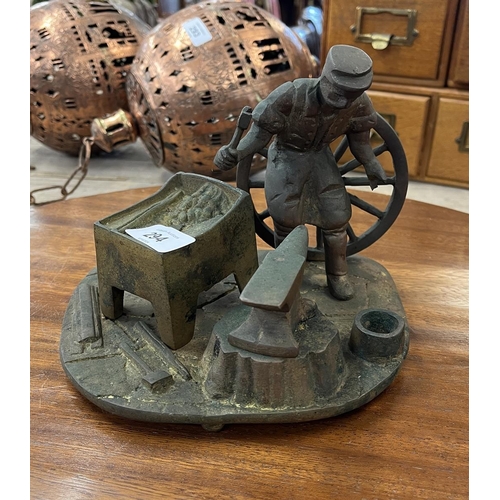 294 - Brass statue of blacksmith