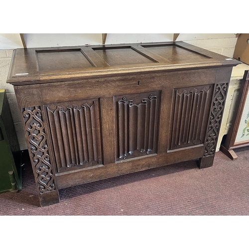 393 - Oak blanket box with linen-fold panels - Approx W: 119cm D: 63cm H:77cm