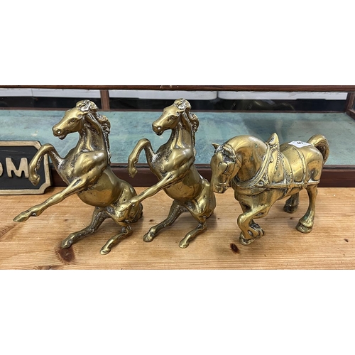 450 - Pair of brass rearing horses together with another