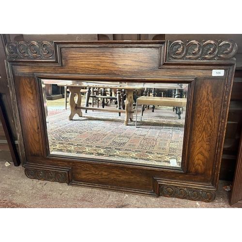 506 - Early 20thC carved oak framed bevelled glass mirror