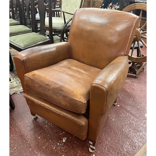 525 - Antique tan leather armchair