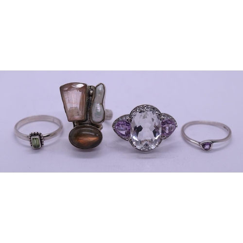 67 - 4 stone set silver rings