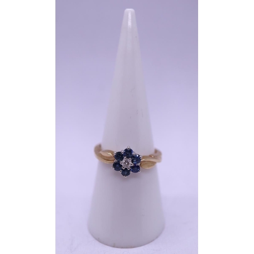 70 - 9ct gold diamond and sapphire set cluster ring - Size N