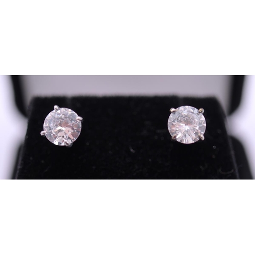 73 - Pair of artificial diamond stud earrings