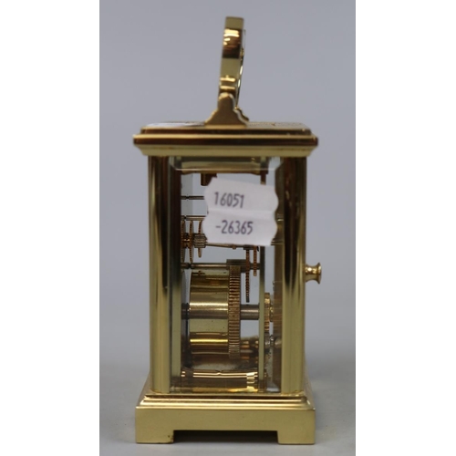 171 - Carriage clock by Woodford