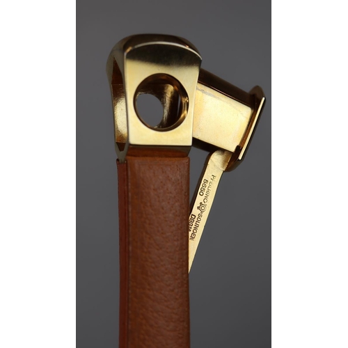 174 - Leather cigar case with crest, plus brass cigar cutter by Pfeilring of Solingen.