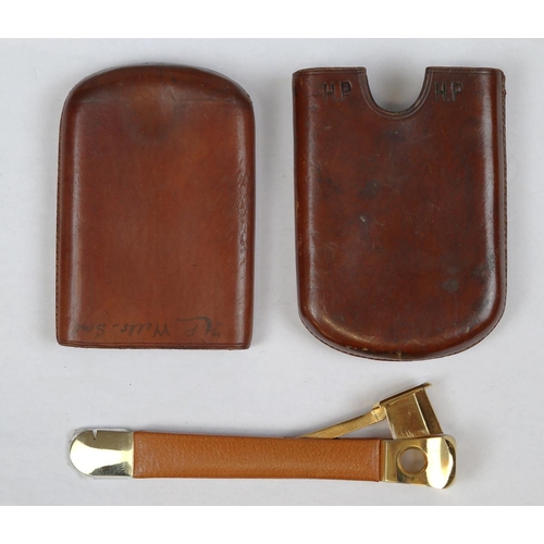 174 - Leather cigar case with crest, plus brass cigar cutter by Pfeilring of Solingen.