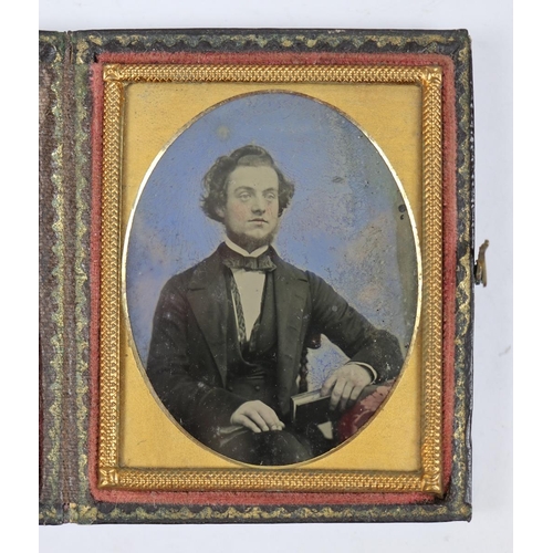 177 - Miniature framed tinted photograph of a gentleman