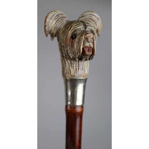 180 - Bamboo cane swordstick with carved wooden handle of a Yorkshire Terrier - Approx length 90cm