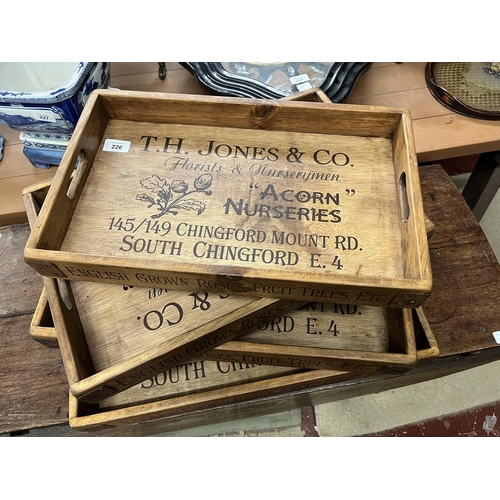 226 - Set of 4 graduated wooden advertising trays