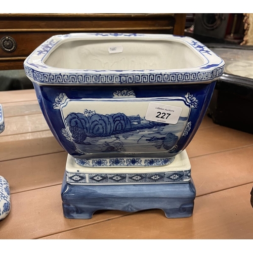 227 - 2 Oriental blue and white planters with stands