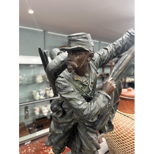 246 - Large spelter figure of a French soldier labeled Jamais (never)