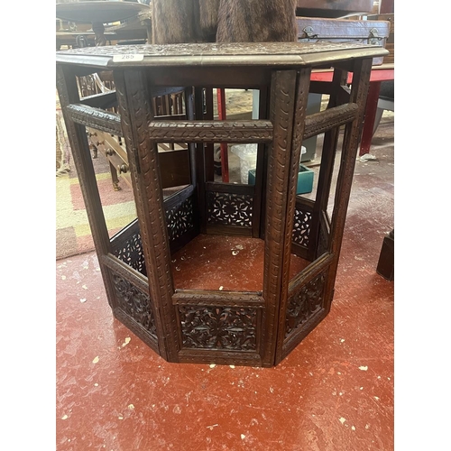 285 - Antique carved octagonal folding table