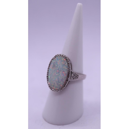 29 - Opal & stone set silver ring - Size L