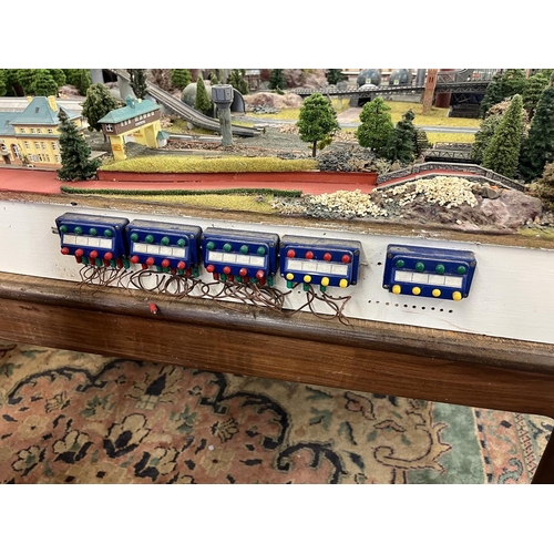 302 - Marklin Z-gauge model train set diorama on table. Wired with track but no rolling stock. Complete wi... 