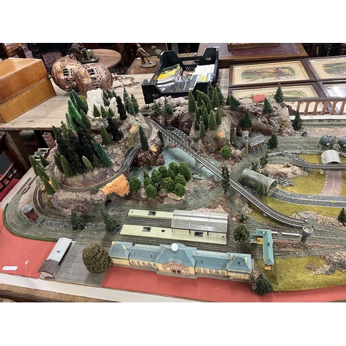 302 - Marklin Z-gauge model train set diorama on table. Wired with track but no rolling stock. Complete wi... 