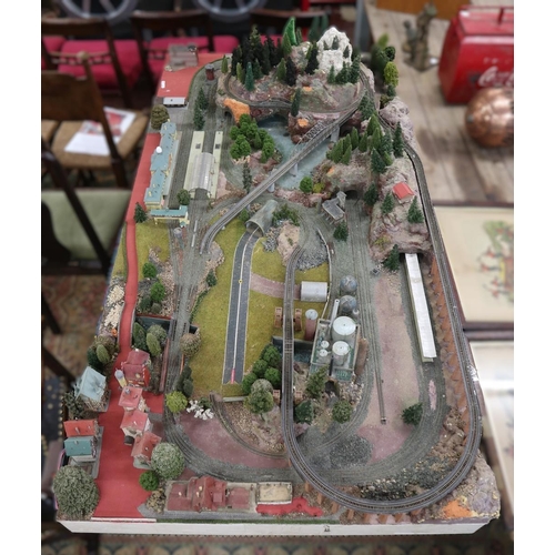 302 - Marklin Z-gauge model train set diorama on table. Wired with track but no rolling stock. Complete wi... 