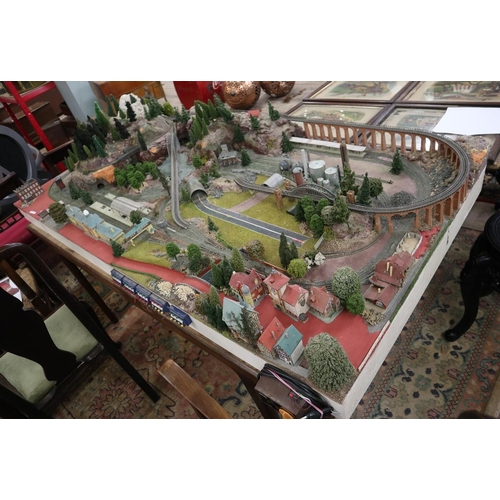 302 - Marklin Z-gauge model train set diorama on table. Wired with track but no rolling stock. Complete wi... 