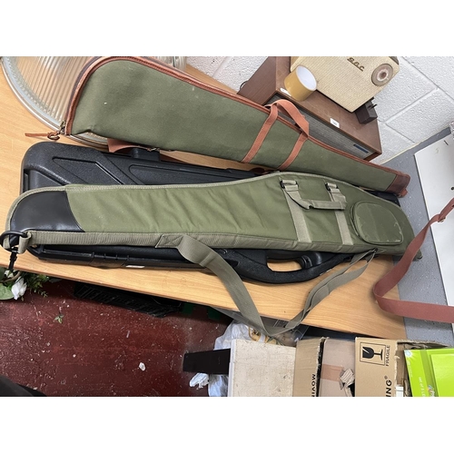 379 - 3 gun cases and an ammo bag