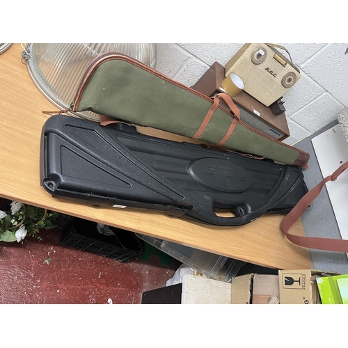 379 - 3 gun cases and an ammo bag