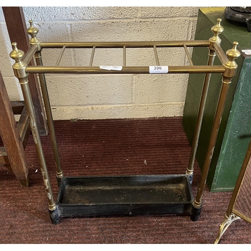 390 - Brass and cast iron stick stand together with a beveled glass mirror screen painted with flowers