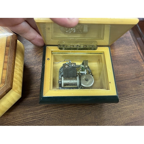 422 - 4 inlaid music boxes