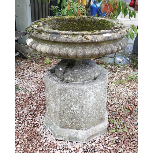 543 - Pair of large reconstituted stone planters on plinths - Approx height 90cm