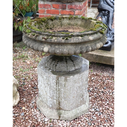 543 - Pair of large reconstituted stone planters on plinths - Approx height 90cm