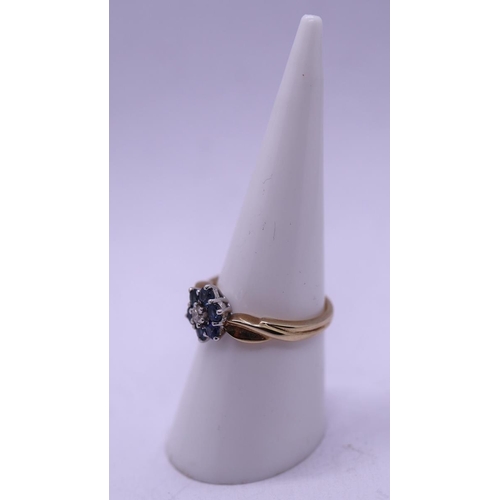 70 - 9ct gold diamond and sapphire set cluster ring - Size N