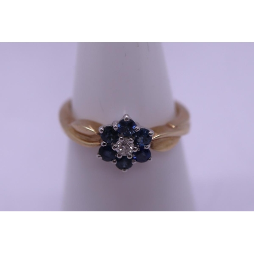 70 - 9ct gold diamond and sapphire set cluster ring - Size N