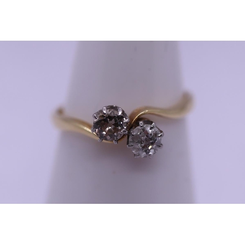 71 - 18ct gold diamond 2 stone set ring - Size L