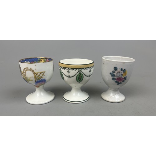 193 - Collection of ceramics to include egg cups to include antique examples