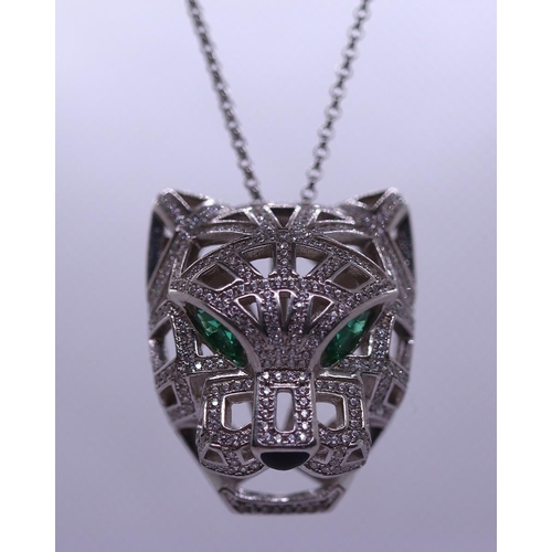 12 - Silver stone set leopards head pendent on chain