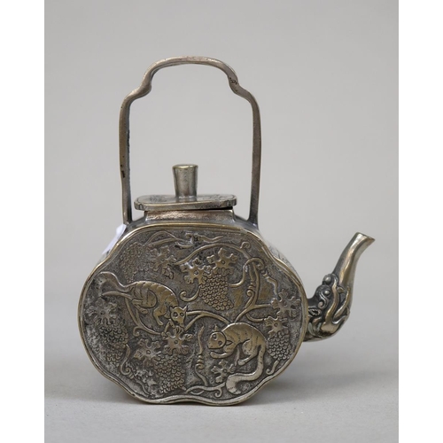 129 - Chinese animal engraved white metal and brass teapot