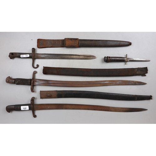 137 - Collection of bayonets together with WW2 fighting knife