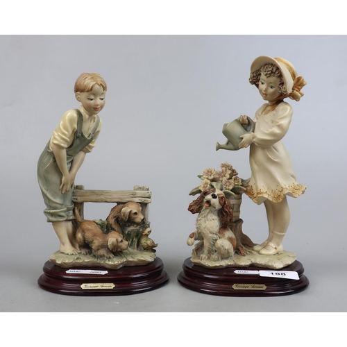 188 - 2 Guiseppe Armani figurines - Boy with dogs and girl watering flowers