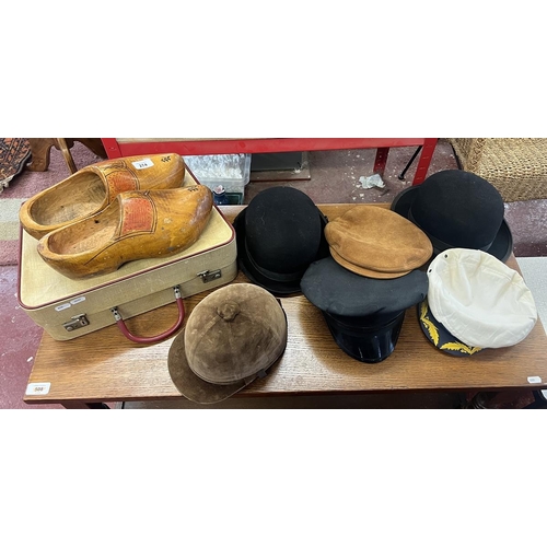 274 - Collection of riding hats and other plus vintage suitcase with 2 pairs wooden clogs