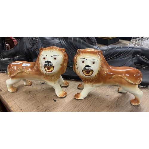 291 - 2 large Staffordshire ceramic lions - Approx L: 33cm