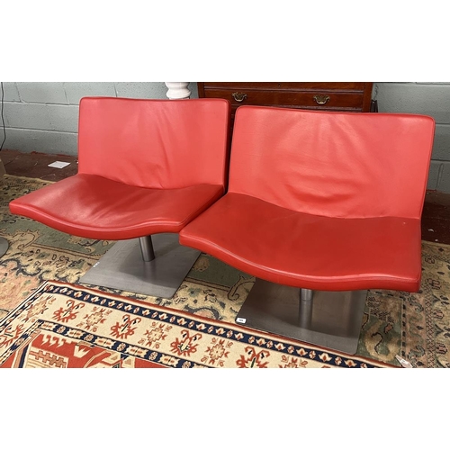 324 - A pair of Peter Maly for Tonon Italia wave chairs