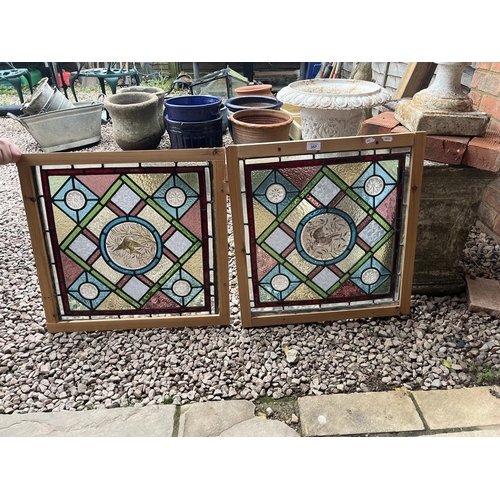 357 - Pair of stained glass windows - Both approx 55cm x 58cm