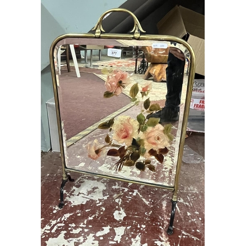 377 - Brass framed fire screen with painted bevelled glass mirror